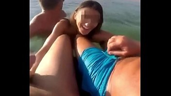 Play Cuckold sharing his girlfriend with a lot of people at the beach