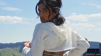 Play Indian MILF model stripteasing outdoor and plays with a hose